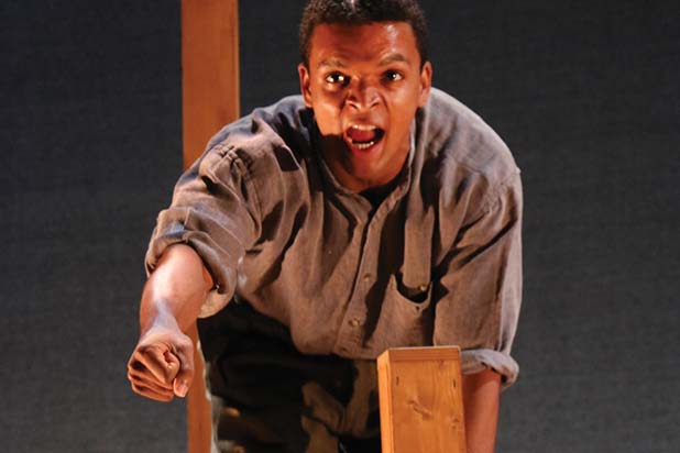 A man acting in a production.